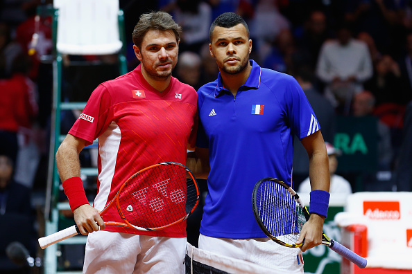 Jo-Wilfried Tsonga et Stanislas Wawrinka lors de leur dernière rencontre à Lille le 21 novembre 2014 pendant la Coupe Davis (Julian Finney/Getty Images)