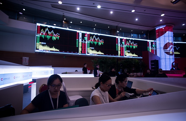 Marchés des Changes de Lujiazui, Shangaï, le 22 septembre 2015. ( JOHANNES EISELE/AFP/Getty Images)