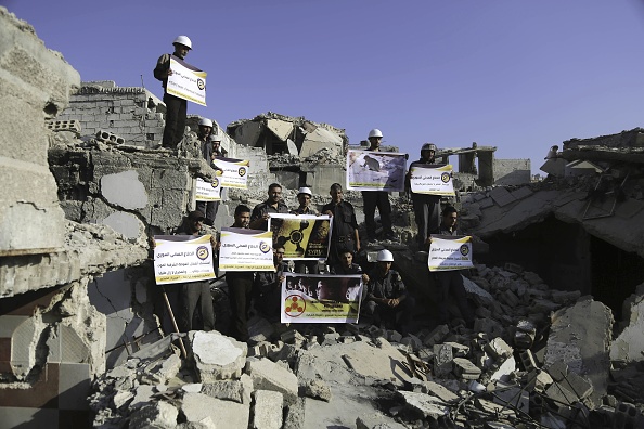 Des images horribles d'une attaque présumée d'armes chimiques en Syrie ont choqué le monde en août 2013.  Une alliance de l'opposition a déclaré que 1300 personnes avaient été tuées, tandis que le gouvernement a nié toute responsabilité.  ( AMER ALMOHIBANY / AFP / Getty Images)


