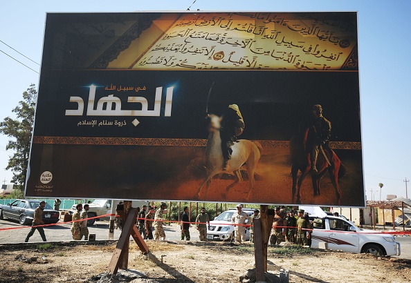 Une publicité du groupe terroriste État Islamique appelant au "Djihad" le 6 octobre 2017, à Hawija en Irak. 
(AHMAD AL-RUBAYE/AFP/Getty Images)