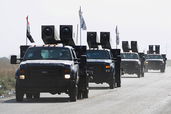 Des forces irakiennes en route vers les positions des Peshmergas le 14 octobre 2017 au sud de Kirkuk.
(AHMAD AL-RUBAYE/AFP/Getty Images)