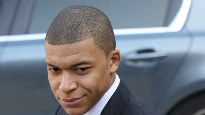 L'attaquant français du Paris Saint-Germain Kylian Mbappé après un déjeuner avec le président français,  le 21 février 2018 à Paris.  Photo LUDOVIC MARIN/AFP/Getty Images.