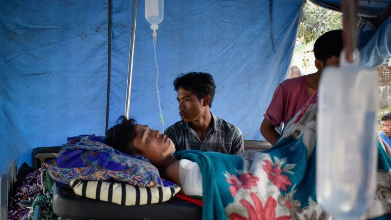 Un puissant séisme sur l'île touristique indonésienne de Lombok a fait au moins 13 morts, blessé des centaines et endommagé des milliers de maisons. Photo AULIA AHMAD / AFP / Getty Images.