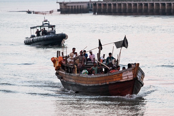 -20 réfugiés Rohingyas se sont rendus en Malaisie. Photo Malaysia OUT / AFP / Getty Images.