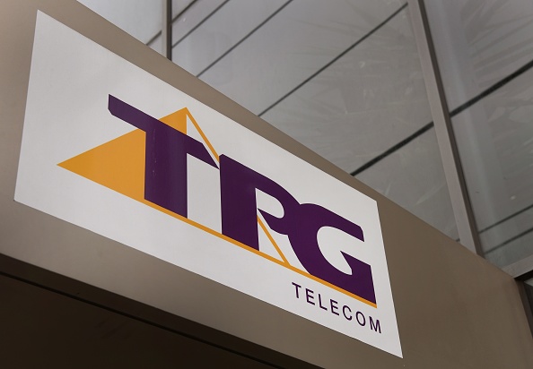 -Une enseigne de TPG Telecom orne le siège de Melbourne. Une fusion pourrait s’envisager avec Vodafone Australia, détenue par la compagnie CK Hutchison de Hong Kong et le britannique Vodafone Group. Photo de WILLIAM WEST / AFP / Getty Images.