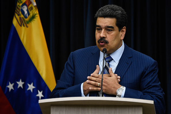 -Le président vénézuélien, Nicolas Maduro, lors d'une conférence de presse avec des correspondants des médias internationaux au palais présidentiel Miraflores de Caracas, le 12 décembre 2018. Photo FEDERICO PARRA / AFP / Getty Images.