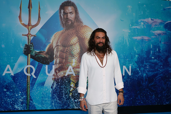 -Jason Momoa pose à la première australienne d'Aquaman le 18 décembre 2018 à Gold Coast, en Australie. Photo de Chris Hyde / Getty Images.