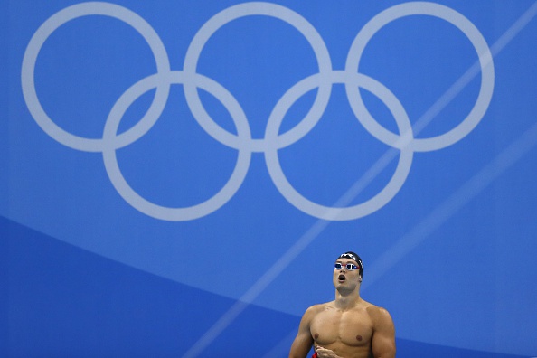 -Le Français Florent Manaudou se prépare à participer à une épreuve de qualification pour le 50m libre masculin lors de la compétition de natation des Jeux olympiques de Rio 2016 au Stade Olympique d'Aquatics de Rio de Janeiro le 11 août 2016. Photo ODD ANDERSEN / AFP / Getty Images.