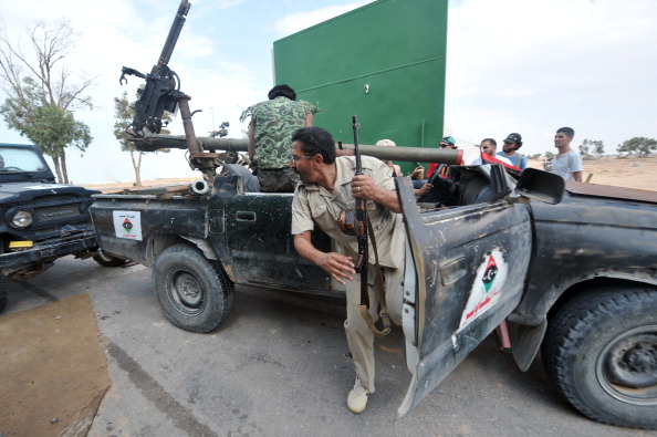 -« Cette guerre est en train de devenir une guerre par procuration entre puissances rivales du Moyen-Orient", prévient Wolfram Lacher. Photo ARIS MESSINIS / AFP / Getty Images.