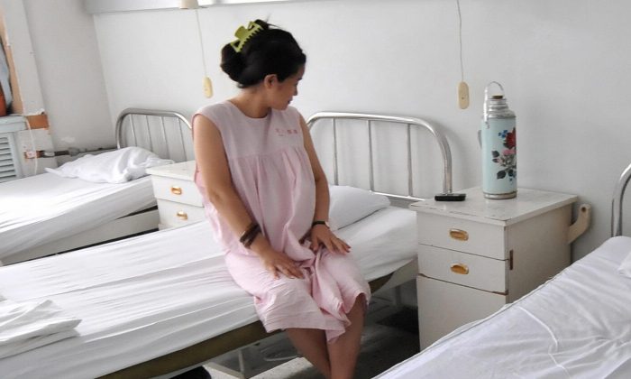 Une femme dans un service d'obstétrique en Chine. (Frederic J. Brown/AFP/Getty Images)
