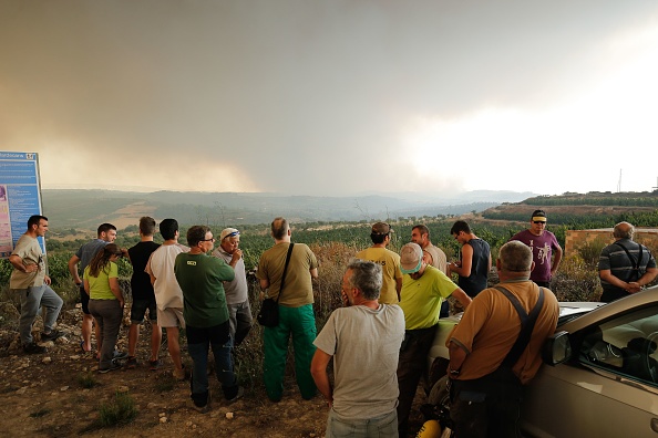 34 des 50 provinces d'Espagne sont en état d'alerte incendie, notamment la Catalogne où les pompiers combattent un feu qui a déjà parcouru 6.500 hectares et reste hors de contrôle. (PAU BARRENA/AFP/Getty Images)