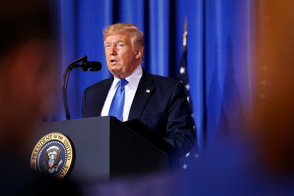 -Le président des États-Unis, Donald Trump, prend la parole lors d'une conférence de presse en marge du sommet du G20 à Osaka, le 29 juin 2019. Photo de Jacquelyn Martin / AFP / Getty Images.