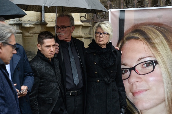 Jonathann Daval et les parents d'Alexia Daval le 8 novembre 2017. (SEBASTIEN BOZON/AFP/Getty Images)