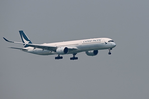 -La compagnie aérienne hongkongaise Cathay Pacific a dû annuler des vols cette semaine en raison d'une grève générale. Photo par Anthony WALLACE / AFP / Getty Images.