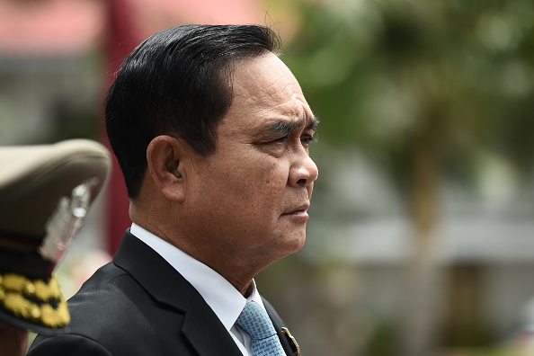 Le Premier ministre thaïlandais Prayut Chan-O-Cha participe à une cérémonie au siège de la police à Bangkok, après l'explosion de plusieurs petites bombes dans la capitale le 2 août 2019. (Photo : LILLIAN SUWANRUMPHA/AFP/Getty Images)