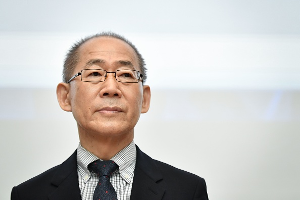 -Le président du Groupe d'experts intergouvernemental sur l'évolution du climat (GIEC), Hoesung Lee, lors d'une conférence de presse consacrée au changement climatique, le 8 août 2019 à Genève. Photo de FABRICE COFFRINI / AFP / Getty Images.