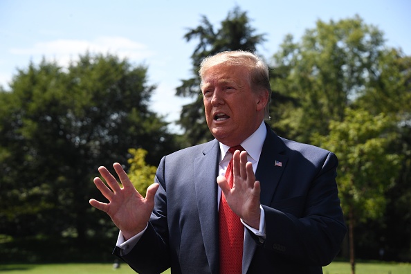 Le président américain Donald Trump s’adresse aux médias lors de son départ de la Maison-Blanche le 21 août 2019 à Washington, DC.(Photo : JIM WATSON/AFP/Getty Images)