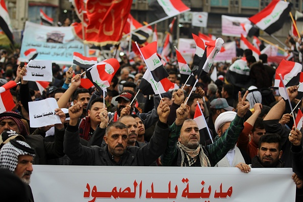 Des manifestants irakiens participent à une manifestation anti-gouvernementale sur la place Tahrir de Bagdad, la capitale, le 6 décembre 2019. (Photo : AHMAD AL-RUBAYE/AFP via Getty Images)