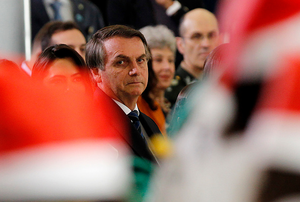 Le président brésilien Jair Bolsonaro participe à un événement de Noël, à l'école publique du district fédéral de Brasilia, le 19 décembre 2019. (Photo : BETO BARATA/AFP via Getty Images)