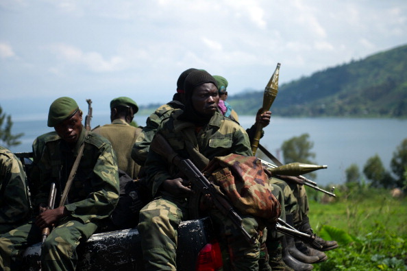 -Illustration- Les soldats du groupe rebelle M23 se rassemblent dans le camp de Rumangabo en République démocratique du Congo. Photo PHIL MOORE/AFP via Getty Images.