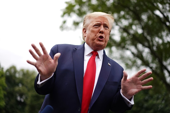 Le président américain Donald Trump s'adresse à la presse dans les jardins de la Maison Blanche avant son départ pour le Michigan, le 21 mai 2020. (Photo : MANDEL NGAN/AFP via Getty Images)