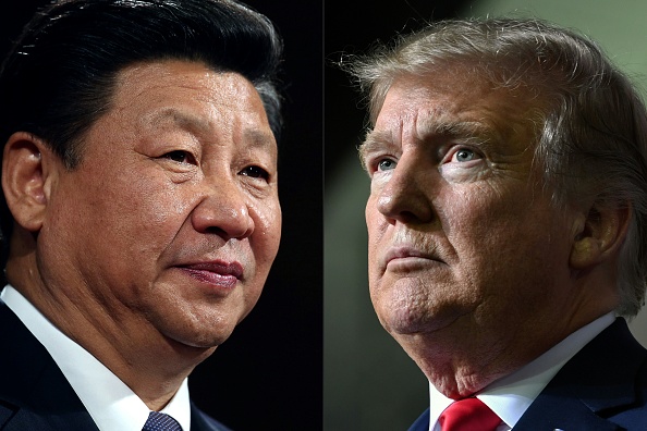 -Le président chinois Xi Jinping et le président américain Donald Trump. Photo de DAN KITWOOD, NICHOLAS KAMM / AFP via Getty Images.