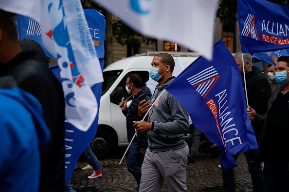 Le syndicat Alliance de la Police nationale  rejoint par UNSA-Police, Synergie et le Syndicat indépendant des commissaires de police (SICP) ont manifesté 12 juin à Paris.  (Photo : THOMAS SAMSON/AFP via Getty Images)