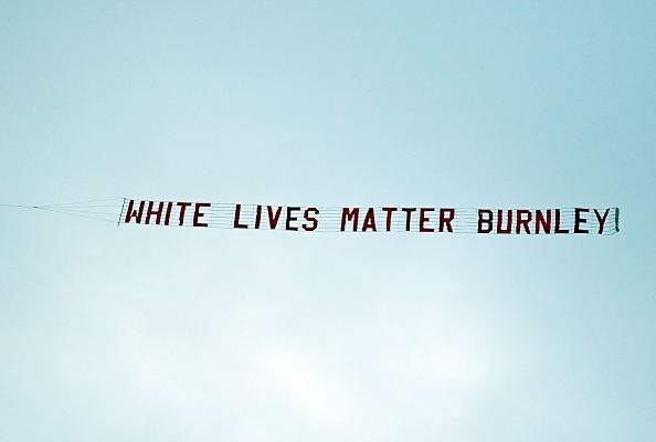 La banderole déployée avant le match Manchester City-Burnley avait été tirée par un avion le 22 juin. (SHAUN BOTTERILL/POOL/AFP via Getty Images)