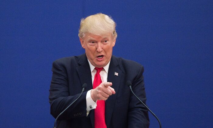 Donald Trump s'exprime dans le Grand palais du Peuple à Pékin, le 9 novembre 2017. (Nicolas Asfouri/AFP via Getty Images)