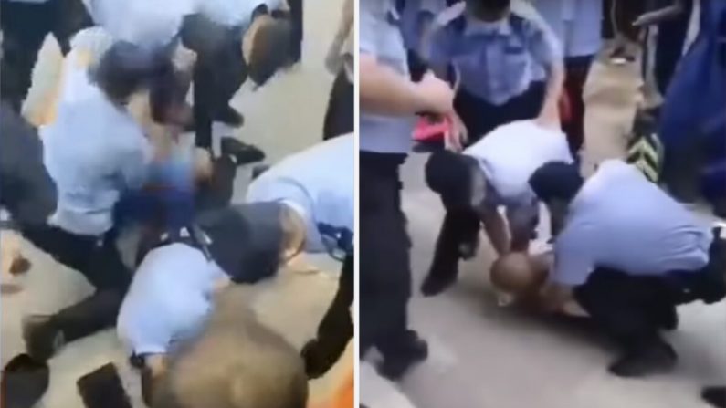 Des citadins et des policiers s'affrontent dans la ville de Xihongmen, près de Pékin, en Chine, le 13 juillet 2020. (capture d'écran vidéo)