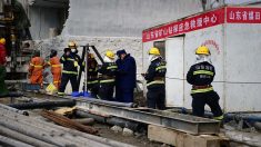 Chine: un des 22 mineurs coincés sous terre a été secouru