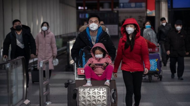 Aéroport de Pékin, Chine. (Crédit photo Kevin Frayer/Getty Images)