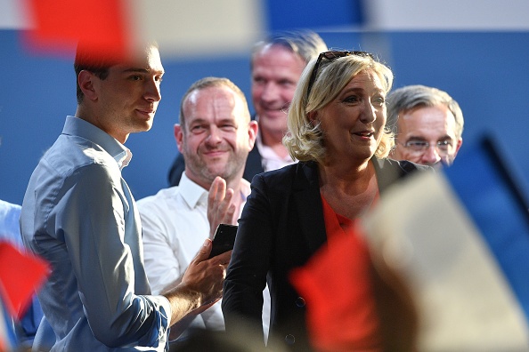 La présidente (RN) Marine Le Pen et Jordan Bardella, premier vice-Président (RN).  (Photo : PHILIPPE HUGUEN/AFP via Getty Images)