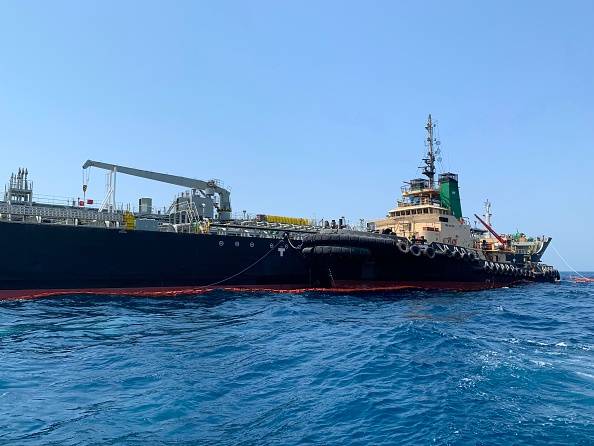 -Illustration- Le pétrolier japonais attaqué dans le golfe d'Oman a été endommagé par une mine patelle ressemblant à des mines iraniennes. Photo de Mumen KHATIB / AFP via Getty Images.