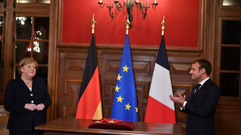 Le Président Emmanuel Macron et la chancelière allemande Angela Merkel. (Photo :  PHILIPPE DESMAZES/POOL/AFP via Getty Images)