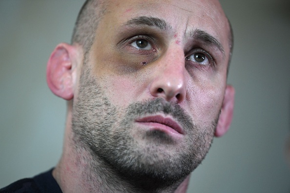 L'entraîneur de judo français Alain Schmitt tient une conférence de presse à Paris le 2 décembre 2021. (ANNE-CHRISTINE POUJOULAT/AFP via Getty Images)