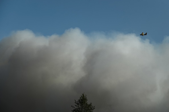 Les fumées des incendies en Gironde se sont fait ressentir jusqu'à Paris. (Photo : PHILIPPE LOPEZ/AFP via Getty Images)