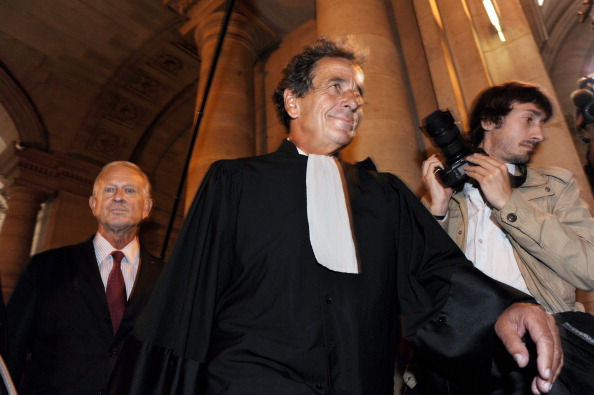 "Nous garderons en nous l'enseignement de Pierre Haïk (au centre). Avec foi. Comme un engagement". (MEHDI FEDOUACH/AFP via Getty Images)