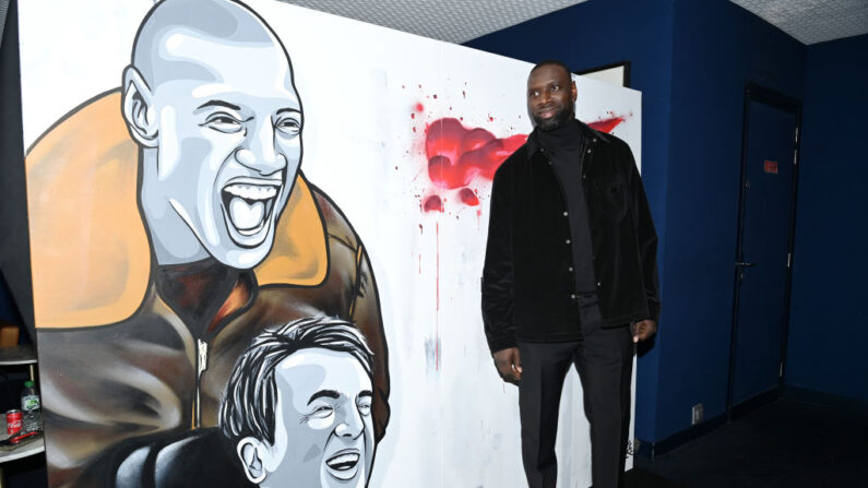 Philippe Pozzo di Borgo, représenté en bas sur la fresque murale, avait inspiré le film Intouchables. (Photo Pascal Le Segretain/Getty Images)