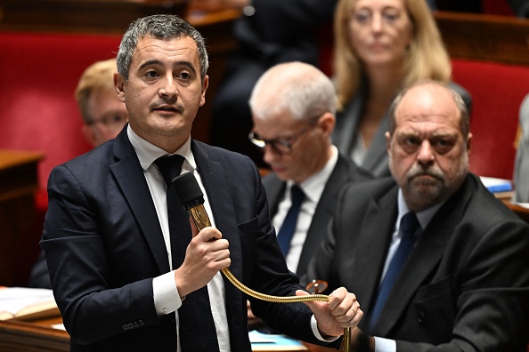 « L'enquête dira si ce sont les personnes qui sont les auteurs de ce crime odieux », a ajouté le ministre de l'Intérieur Gérald Darmanin (à g.). (Photo MIGUEL MEDINA/AFP via Getty Images)