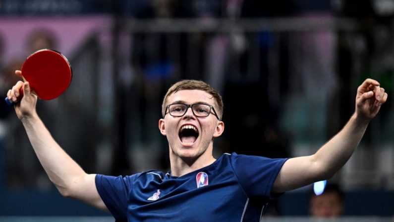 Les frères Lebrun, dans une ambiance de tonnerre, poursuivent leur route aux Jeux olympiques, en ralliant les 8e de finale du simple hommes, lundi. (Photo : WANG ZHAO/AFP via Getty Images)