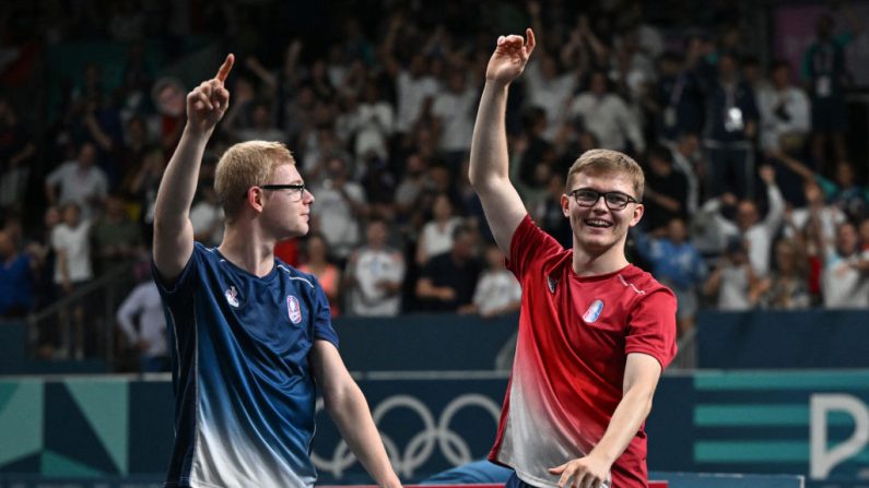 Moins de deux mois après avoir fait chavirer de bonheur le public français lors des JO, les pongistes Félix et Alexis Lebrun renouent avec la compétition à Pékin, lors d'un important tournoi du circuit mondial qui débute dimanche. (Photo : JUNG YEON-JE/AFP via Getty Images)